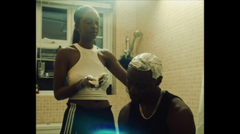 Movie still from “Downtown Kayoto - Came Thru” (2024), directed by Joe Howat – Medium shot, High angle