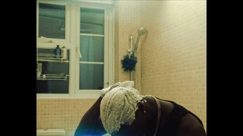 Movie still from “Downtown Kayoto - Came Thru” (2024), directed by Joe Howat – Medium shot, High angle