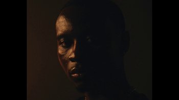 Movie still from “Downtown Kayoto - Came Thru” (2024), directed by Joe Howat – Extreme Close Up shot, Low angle