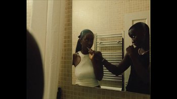Movie still from “Downtown Kayoto - Came Thru” (2024), directed by Joe Howat – Medium shot, Over the shoulder angle