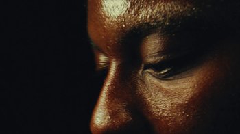 Movie still from “Downtown Kayoto - Came Thru” (2024), directed by Joe Howat – Extreme Close Up shot, High angle