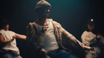 Movie still from “Downtown Kayoto - Came Thru” (2024), directed by Joe Howat – Medium shot, Low angle