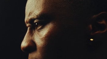 Movie still from “Downtown Kayoto - Came Thru” (2024), directed by Joe Howat – Extreme Close Up shot, Low angle