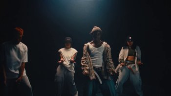 Movie still from “Downtown Kayoto - Came Thru” (2024), directed by Joe Howat – Medium shot, Low angle