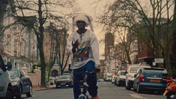 Movie still from “Downtown Kayoto - Came Thru” (2024), directed by Joe Howat – Medium shot, Low angle