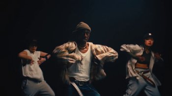 Movie still from “Downtown Kayoto - Came Thru” (2024), directed by Joe Howat – Medium shot, Low angle