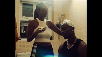 Movie still from “Downtown Kayoto - Came Thru” (2024), directed by Joe Howat – Medium shot, High angle