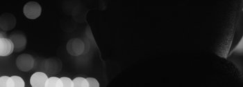 Movie still from “Empimic - Bittere Welt” (2021), directed by Angelo Kovatchev – Extreme Close Up shot, Over the shoulder angle