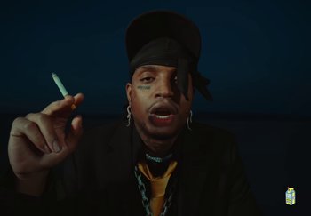 Movie still from “Sheck Wes, JID & Ski Mask The Slump God - Fly Away” (2024), directed by Cole Bennett – Close Up shot, Low angle