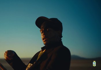 Movie still from “Sheck Wes, JID & Ski Mask The Slump God - Fly Away” (2024), directed by Cole Bennett – Medium shot, Low angle