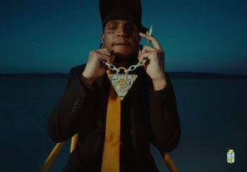 Movie still from “Sheck Wes, JID & Ski Mask The Slump God - Fly Away” (2024), directed by Cole Bennett – Medium shot, Low angle