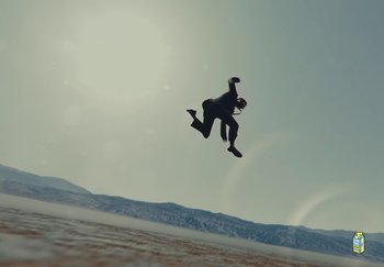 Movie still from “Sheck Wes, JID & Ski Mask The Slump God - Fly Away” (2024), directed by Cole Bennett – Extreme Wide shot, Low angle