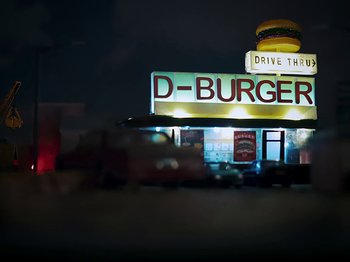 Movie still from “Danny Brown feat. Bruiser Wolf - Y.B.P.” (2024), directed by Edem Wornoo – Extreme Wide shot, Overhead angle