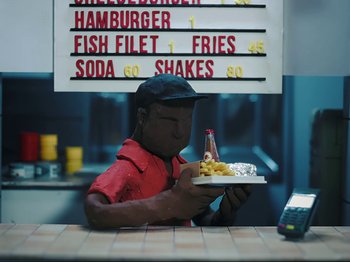 Movie still from “Danny Brown feat. Bruiser Wolf - Y.B.P.” (2024), directed by Edem Wornoo – Extreme Close Up shot, High angle