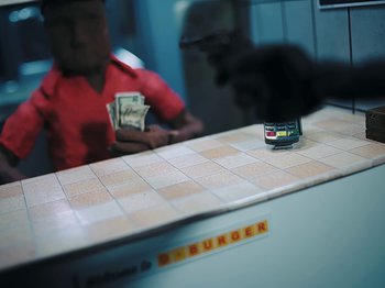 Movie still from “Danny Brown feat. Bruiser Wolf - Y.B.P.” (2024), directed by Edem Wornoo – Extreme Close Up shot, High angle