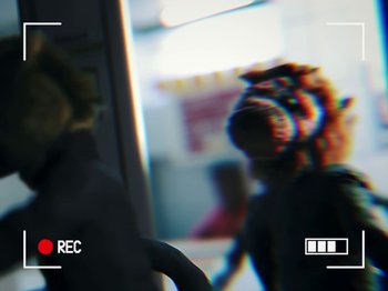Movie still from “Danny Brown feat. Bruiser Wolf - Y.B.P.” (2024), directed by Edem Wornoo – Extreme Close Up shot, Over the shoulder angle