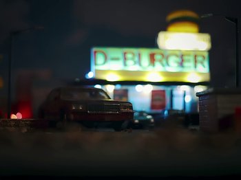 Movie still from “Danny Brown feat. Bruiser Wolf - Y.B.P.” (2024), directed by Edem Wornoo – Extreme Close Up shot, Low angle