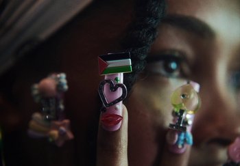 Movie still from “AJ Tracey - Bubble Bath” (2024), directed by Late Milk – Extreme Close Up shot, High angle