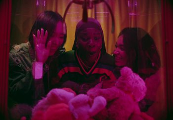 Movie still from “AJ Tracey - Bubble Bath” (2024), directed by Late Milk – Medium shot, High angle