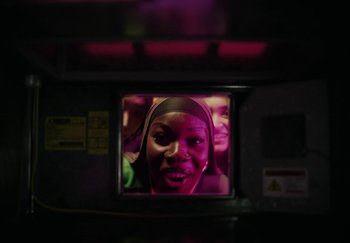 Movie still from “AJ Tracey - Bubble Bath” (2024), directed by Late Milk – Extreme Close Up shot, Low angle