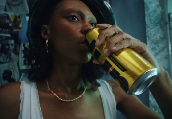 Movie still from “AJ Tracey - Bubble Bath” (2024), directed by Late Milk – Close Up shot, High angle