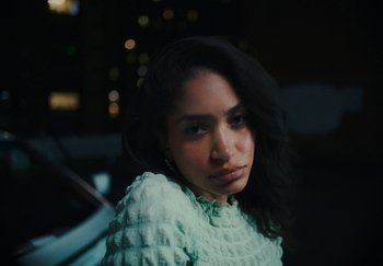 Movie still from “AJ Tracey - Bubble Bath” (2024), directed by Late Milk – Close Up shot, High angle