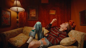 Movie still from “Conswank - Holes In My Denim” (2023), directed by Seamus Brennan – Medium shot, High angle