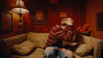 Movie still from “Conswank - Holes In My Denim” (2023), directed by Seamus Brennan – Medium shot, High angle