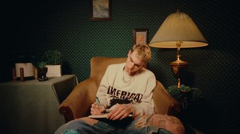 Movie still from “Conswank - Holes In My Denim” (2023), directed by Seamus Brennan – Medium shot, High angle