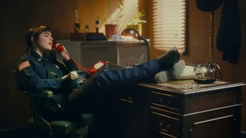Movie still from “Sub Urban feat. BENEE - UH OH!” (2022), directed by Andrew Donoho – Medium shot, High angle