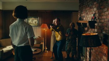 Movie still from “Sub Urban feat. BENEE - UH OH!” (2022), directed by Andrew Donoho – Medium shot, Over the shoulder angle