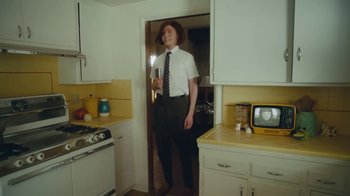 Movie still from “Sub Urban feat. BENEE - UH OH!” (2022), directed by Andrew Donoho – Wide shot, Low angle
