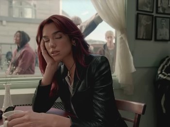 Movie still from “Dua Lipa - Training Season” (2024), directed by Vincent Haycock – Medium shot, High angle