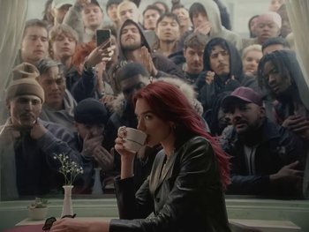 Movie still from “Dua Lipa - Training Season” (2024), directed by Vincent Haycock – Wide shot, Low angle