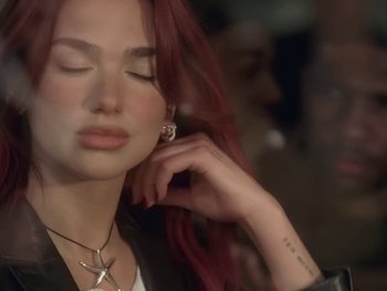 Movie still from “Dua Lipa - Training Season” (2024), directed by Vincent Haycock – Close Up shot, High angle