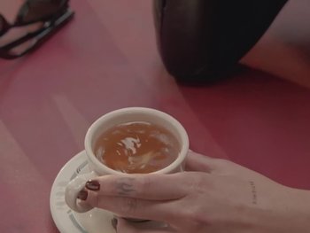 Movie still from “Dua Lipa - Training Season” (2024), directed by Vincent Haycock – Extreme Close Up shot, High angle