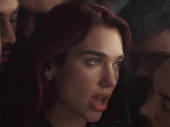 Movie still from “Dua Lipa - Training Season” (2024), directed by Vincent Haycock – Close Up shot, Low angle