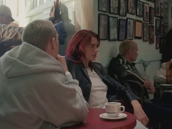 Movie still from “Dua Lipa - Training Season” (2024), directed by Vincent Haycock – Medium shot, Over the shoulder angle
