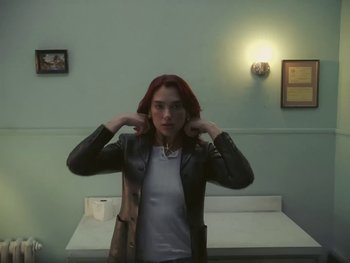 Movie still from “Dua Lipa - Training Season” (2024), directed by Vincent Haycock – Medium shot, Low angle