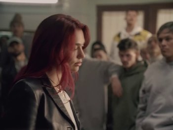 Movie still from “Dua Lipa - Training Season” (2024), directed by Vincent Haycock – Medium shot, Over the shoulder angle
