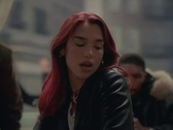 Movie still from “Dua Lipa - Training Season” (2024), directed by Vincent Haycock – Close Up shot, Low angle