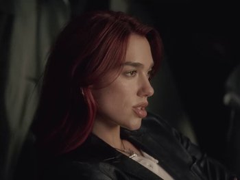 Movie still from “Dua Lipa - Training Season” (2024), directed by Vincent Haycock – Close Up shot, Low angle