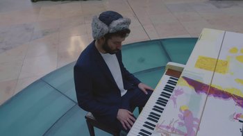 Movie still from “AJR - The DJ Is Crying For Help” (2022), directed by Austin Roa – Medium shot, High angle