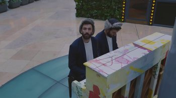 Movie still from “AJR - The DJ Is Crying For Help” (2022), directed by Austin Roa – Medium shot, High angle