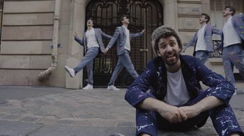 Movie still from “AJR - The DJ Is Crying For Help” (2022), directed by Austin Roa – Wide shot, Low angle