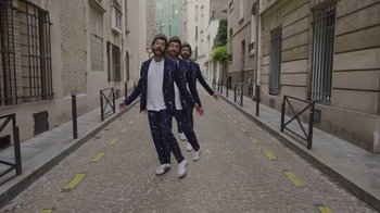 Movie still from “AJR - The DJ Is Crying For Help” (2022), directed by Austin Roa – Extreme Wide shot, Low angle