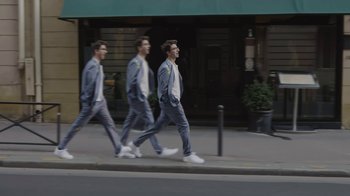 Movie still from “AJR - The DJ Is Crying For Help” (2022), directed by Austin Roa – Wide shot, Low angle