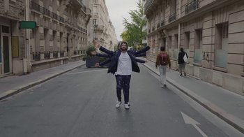 Movie still from “AJR - The DJ Is Crying For Help” (2022), directed by Austin Roa – Wide shot, Low angle