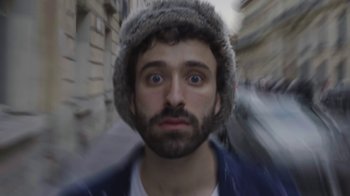 Movie still from “AJR - The DJ Is Crying For Help” (2022), directed by Austin Roa – Extreme Close Up shot, High angle