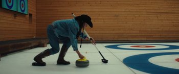 Movie still from “Bally - Curling” (2022), directed by Marie Schüller – Medium shot, High angle